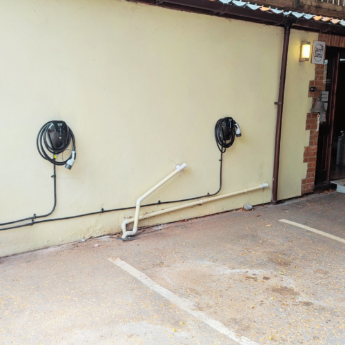 2 EV chargers on a wall